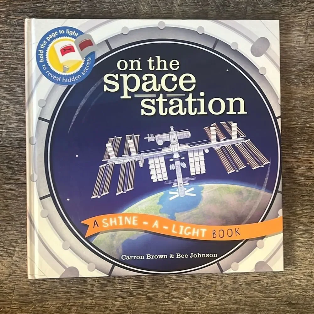 Kane Miller On the Space Station Shine-A-Light Kids Hardcover Flashlight Book